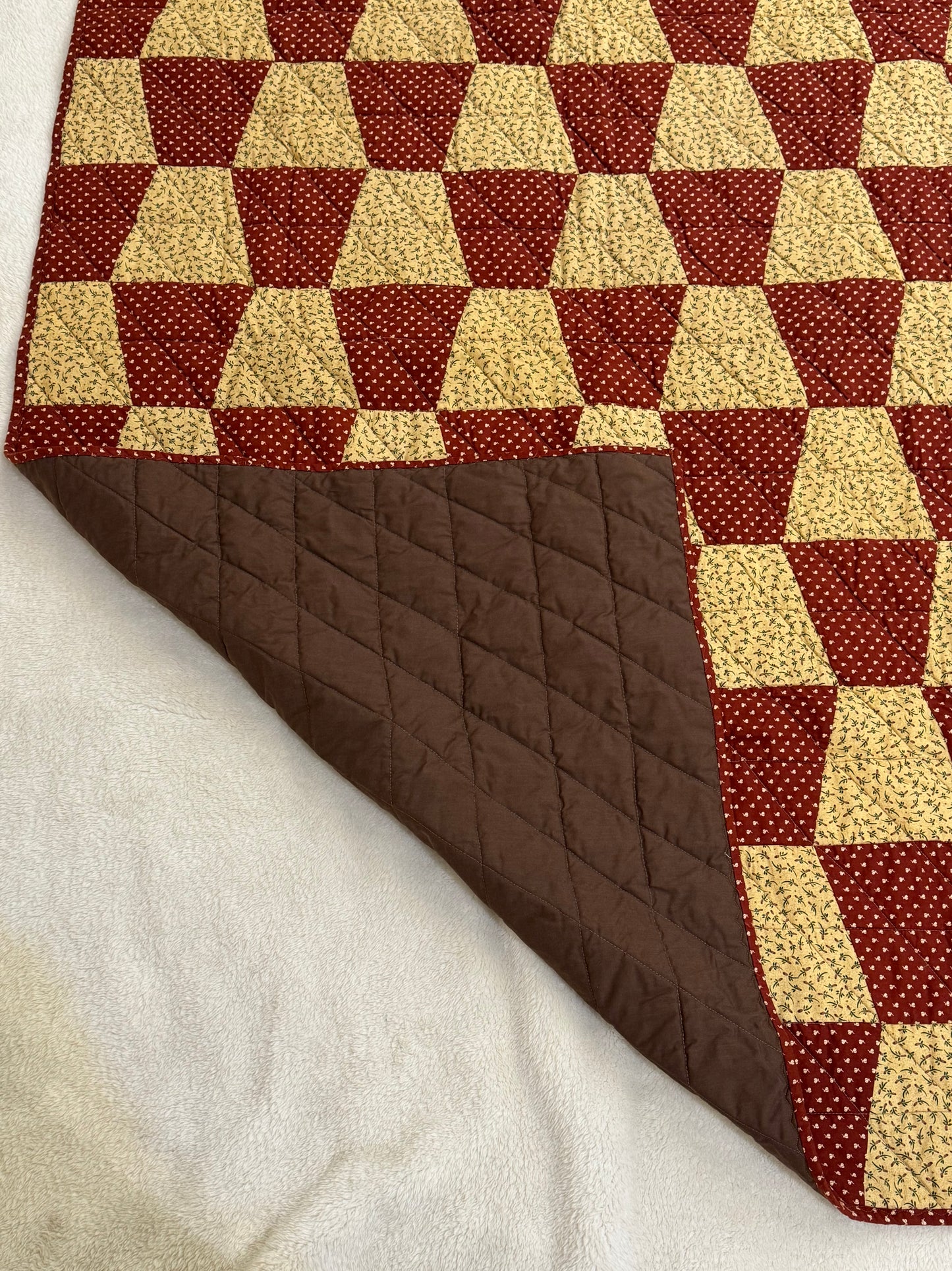 Checkered Brown & Golden Lap Quilt
