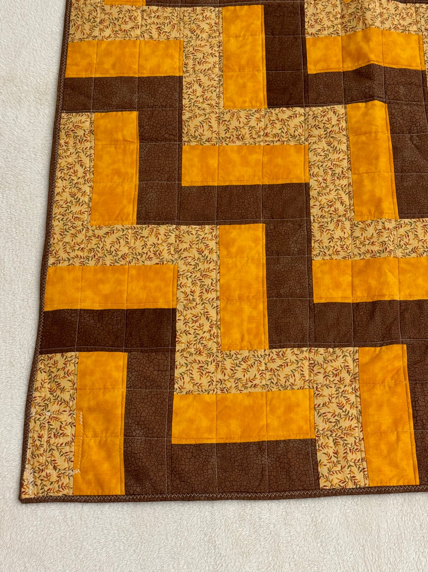 Brown & Golden Geometric Chevron Lap Quilt