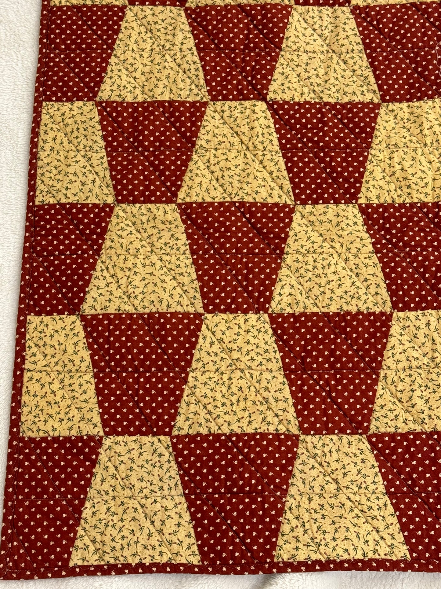 Checkered Brown & Golden Lap Quilt